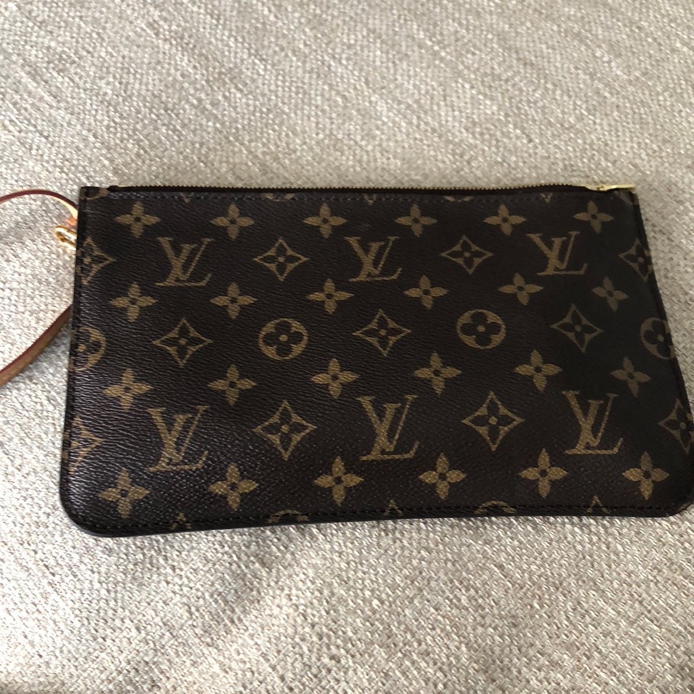 LV monogram never full wristlet bag